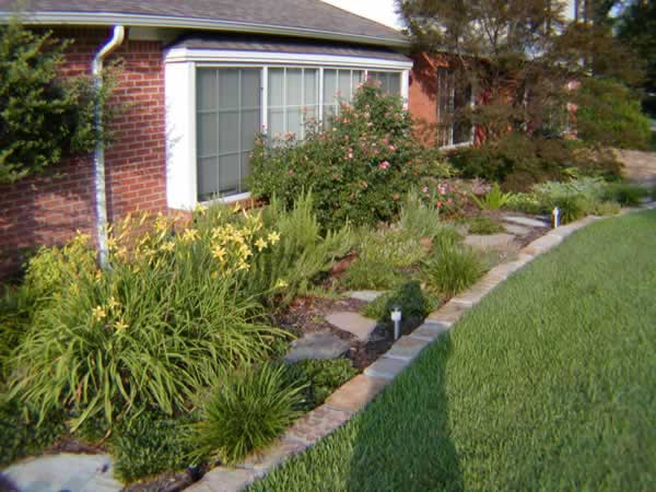 flowerbed landscaping by Grasseaters, Inc.